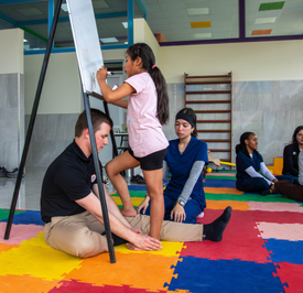 DPT students with patient