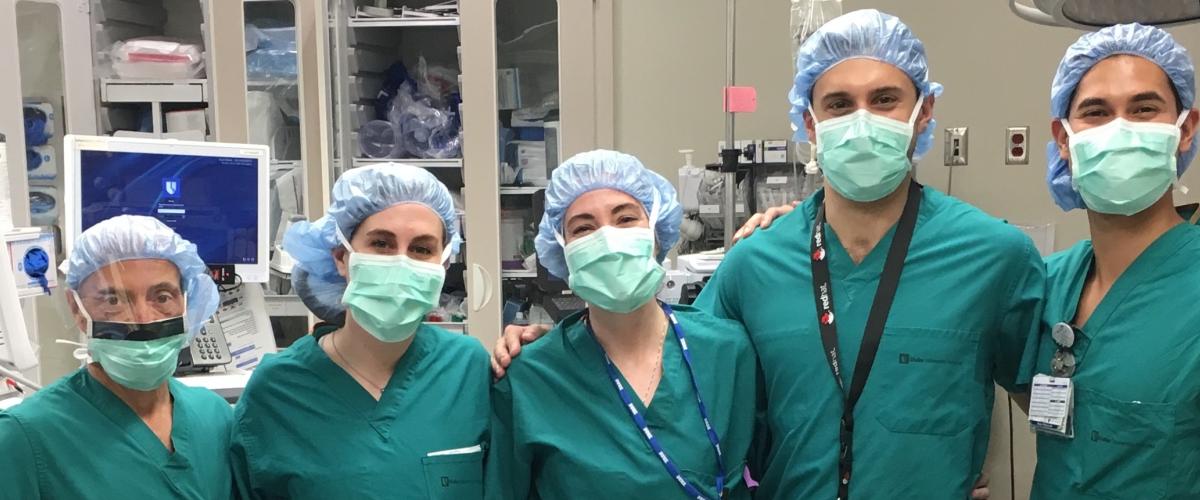 A photo of residents in the OR